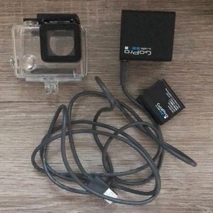 GoPro hero 4 battery, charger, and housing